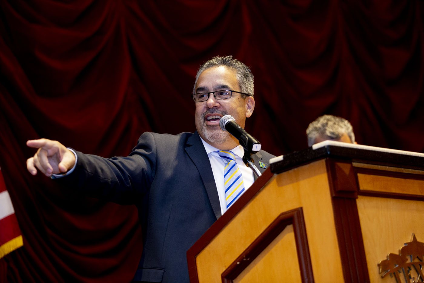Latin Chamber of Commerce leader speaking at a Las Vegas business event